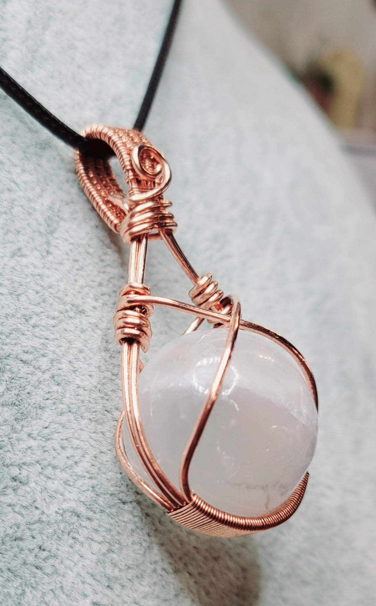 Selenite fidget Pendant
Handwrapped in Copper