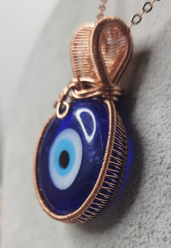 All Seeing Eye Pendent
Hand wrapped in copper wire