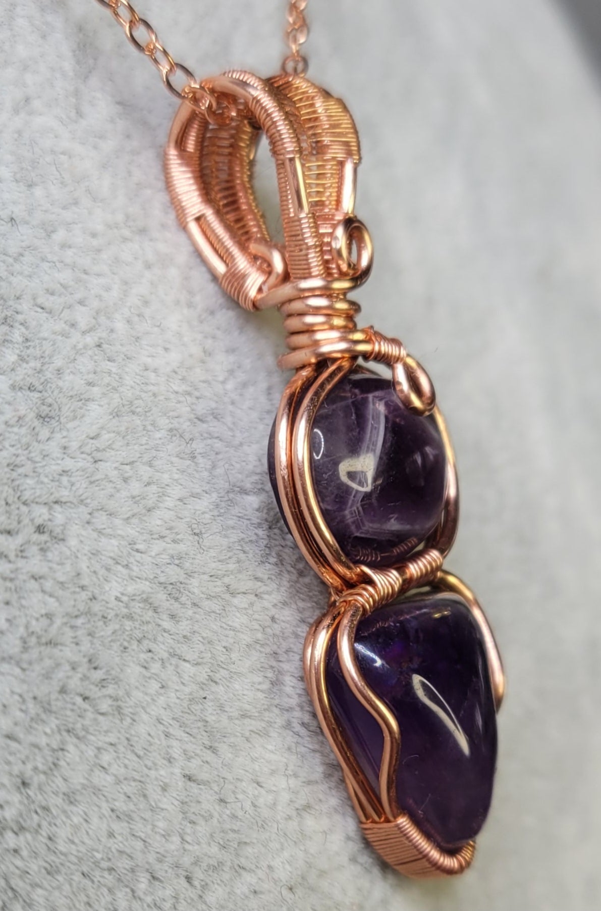 Double Amethyst pendant
Handwrapped in Copper Wire
