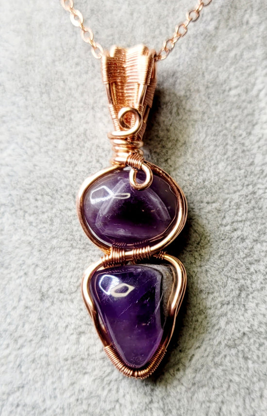 Double Amethyst pendant
Handwrapped in Copper Wire