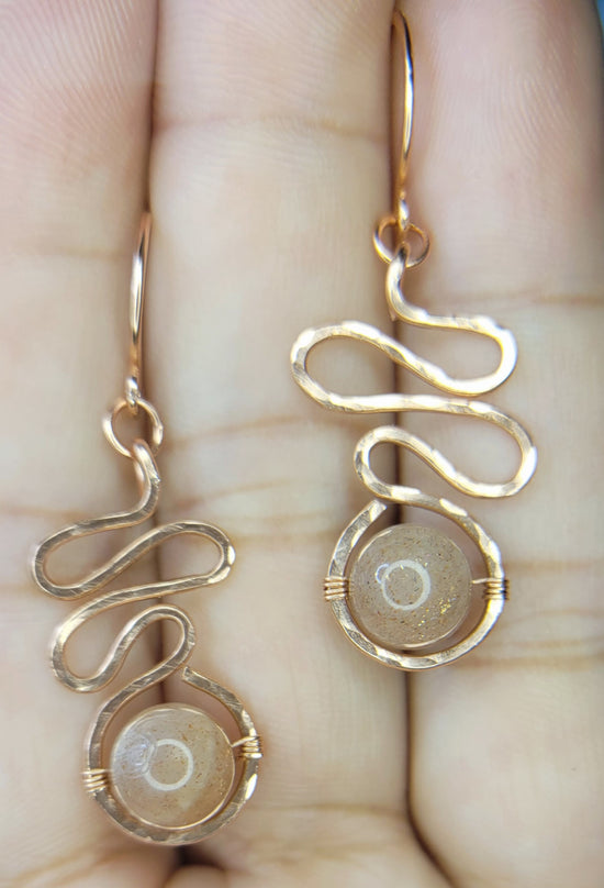Sunstone Earrings 
Hand wrapped in Copper Wire