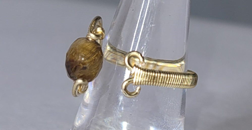 Adjustable Cresent Moon with Tiger Eye
Handwrapped in gold-plated copper