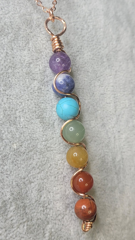 Chakra Pendant
Hand wrapped in Copper