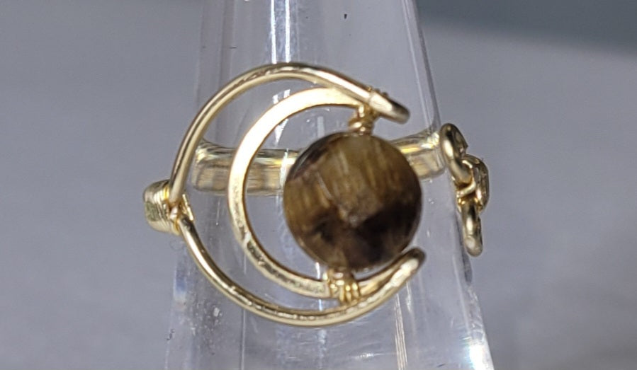 Adjustable Cresent Moon with Tiger Eye
Handwrapped in gold-plated copper