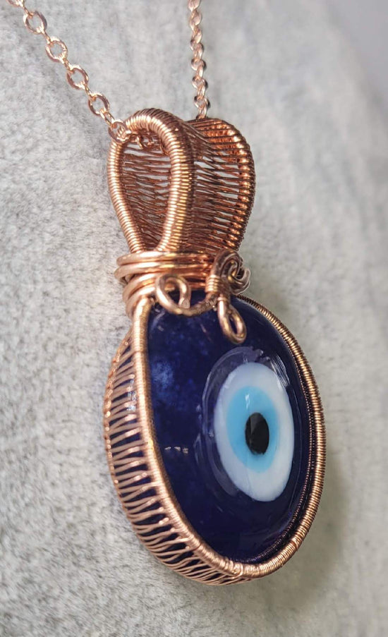All Seeing Eye Pendent
Hand wrapped in copper wire