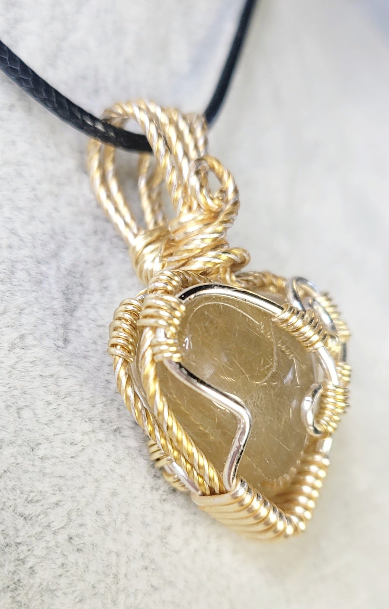 A "Heart for Your Heart"
Rutiled Quarts Heart Pendant
Wire-Wrapped